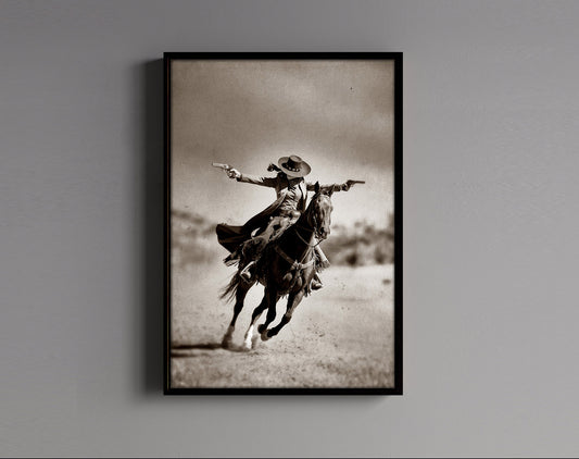 “Cowgirl Outlaw on Horseback” Western canvas wall art by Feather & Bone