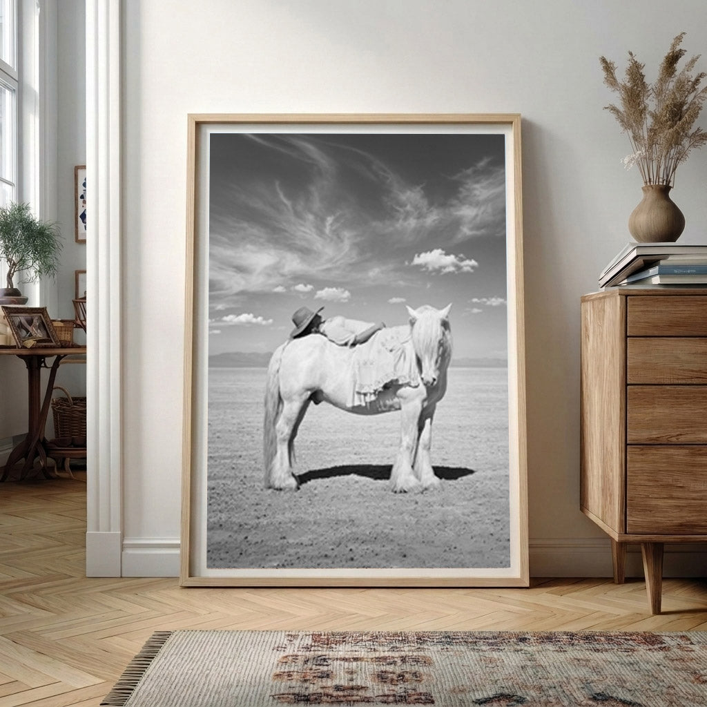PASSAGE equestrian art print leaning in a light wood frame in a modern home