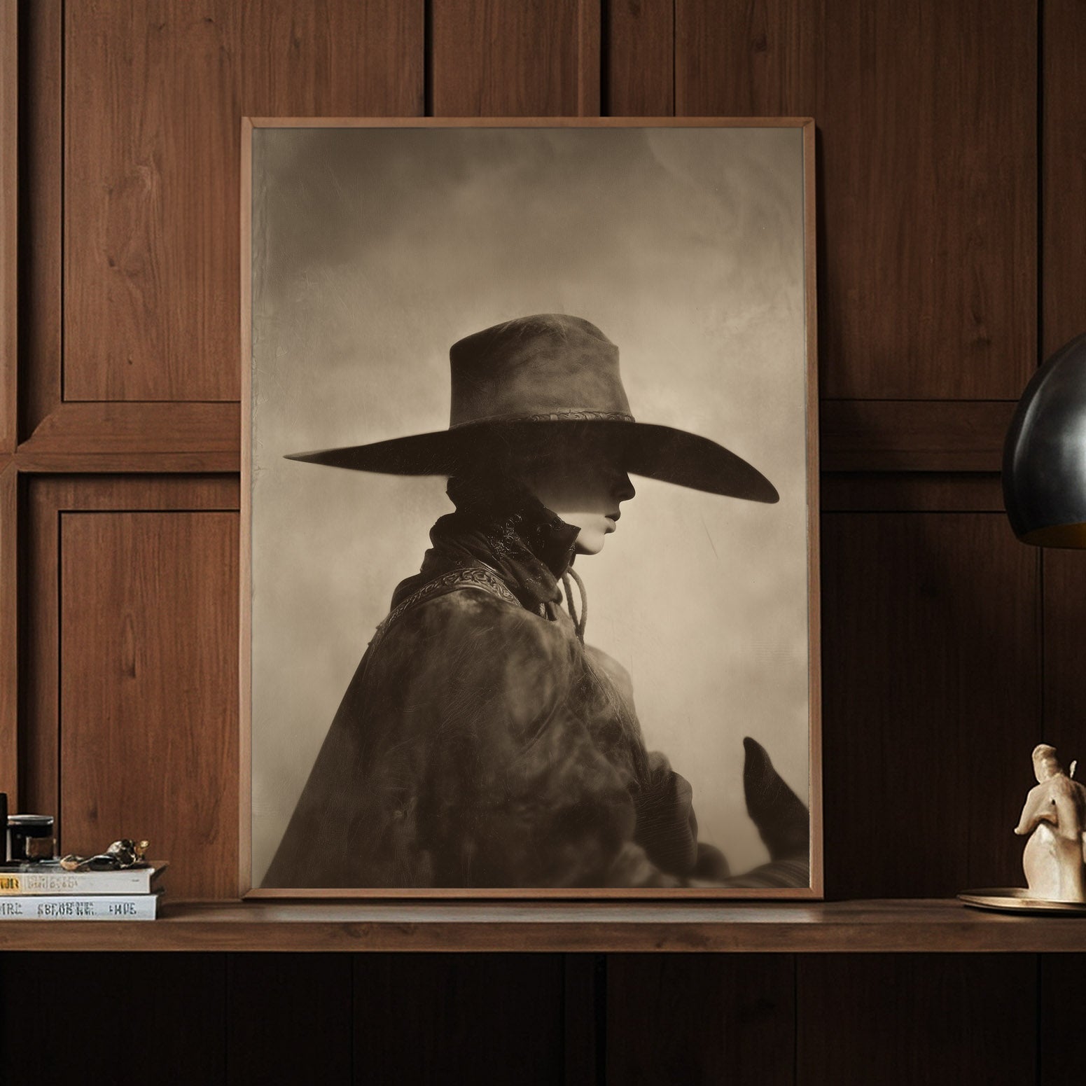 POINT Western figure wall art leaning in a wood-paneled room