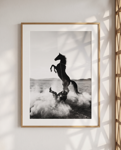 TUGBOAT black-and-white horse and cowboy wall art in a light wood frame